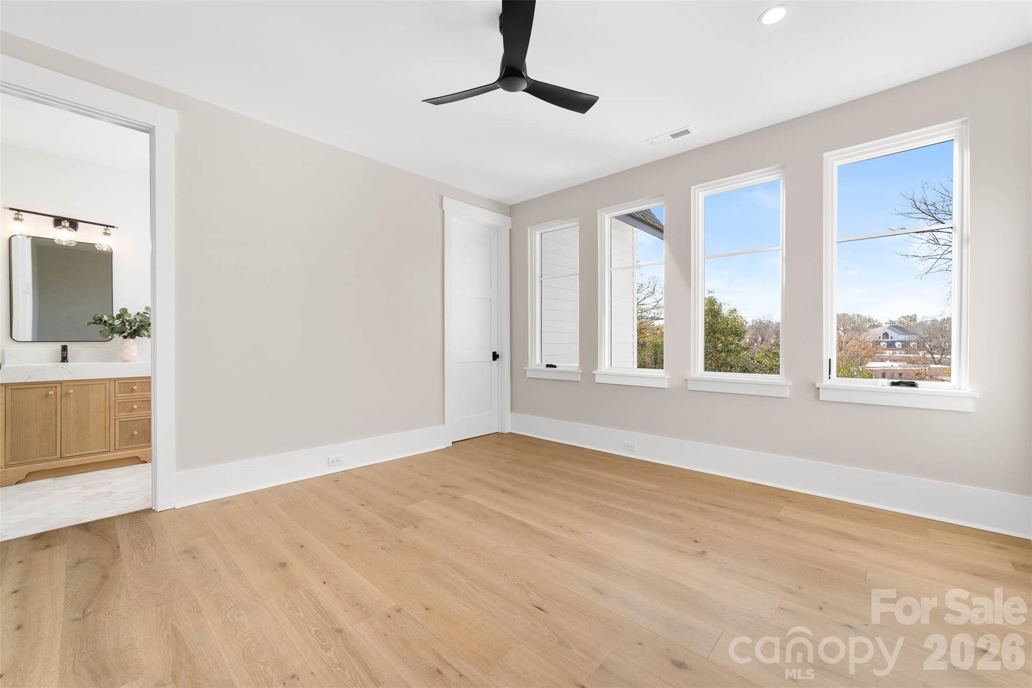 216 Walnut Street Davidson, NC 28036 - Photo 31 of 48 a view of an empty room with a window and bathroom