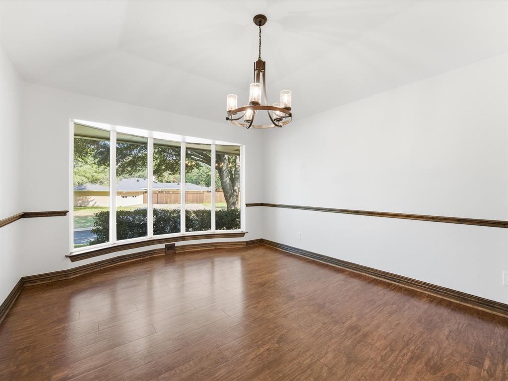 3717 Myrtle Springs Road Benbrook, TX 76116 - Photo 7 of 40 Dining room is flooded with natural light and shaded yard and is large enough for the heirloom dining furniture you have