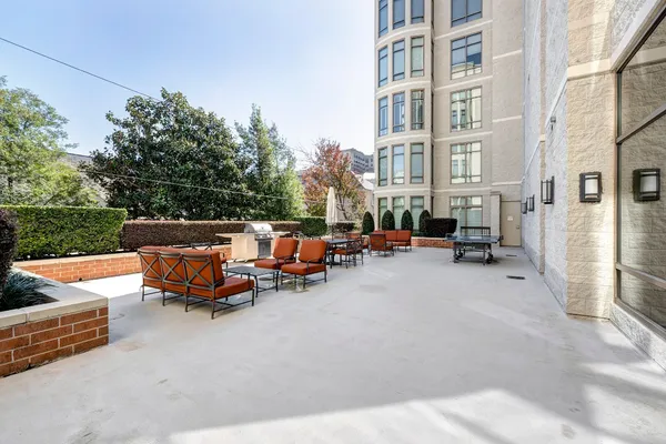 a wooden bench sitting in middle of a building