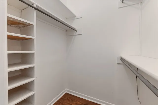 a view of a hallway with closet