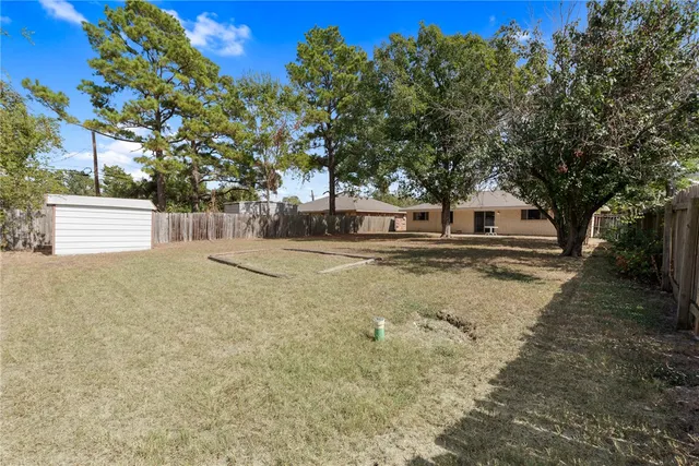 a house with trees in front of it