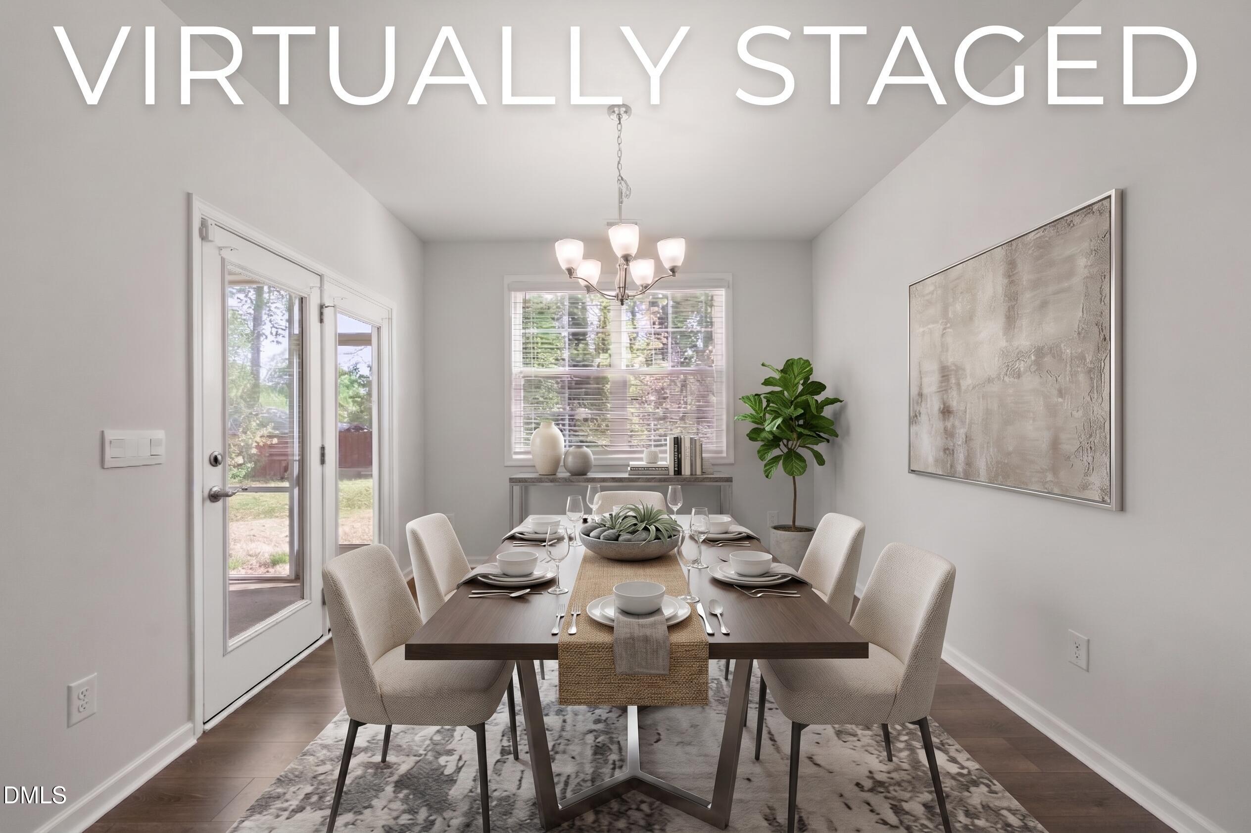 1639 Abberly Place Graham, NC 27253 - Photo 14 of 44 a view of a dining room with furniture window and outside view