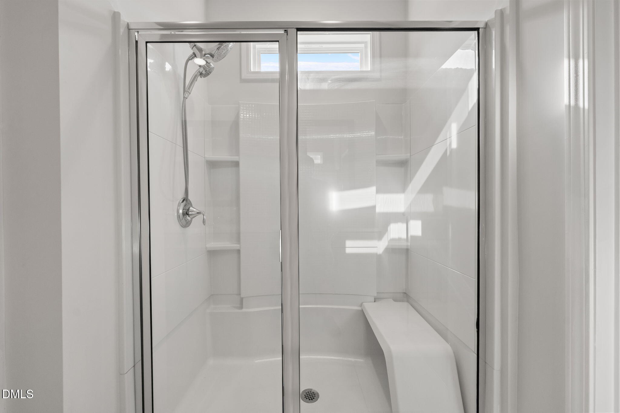 1639 Abberly Place Graham, NC 27253 - Photo 19 of 44 a bathroom with a glass shower door
