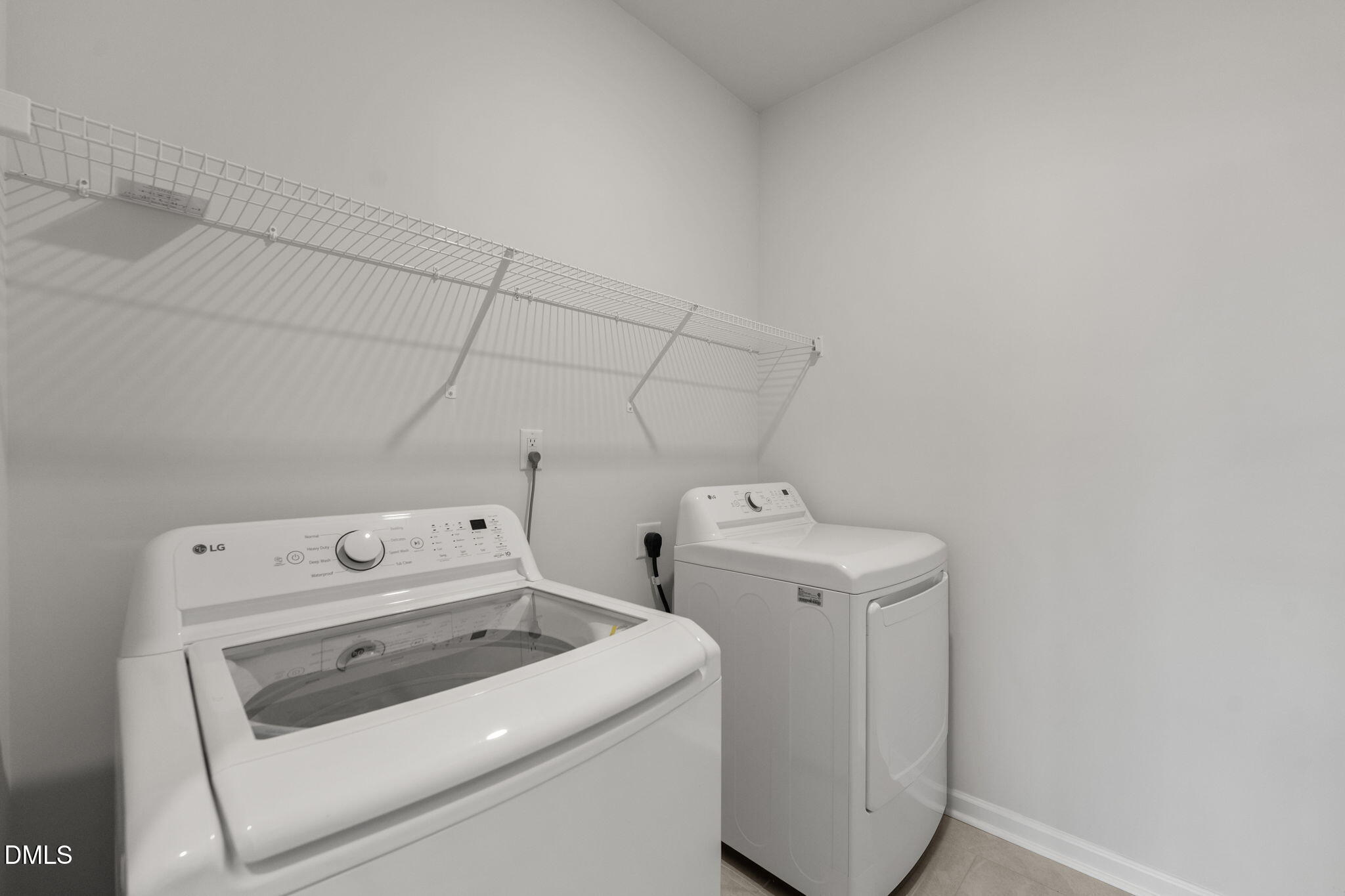1639 Abberly Place Graham, NC 27253 - Photo 21 of 44 a utility room with dryer and washer