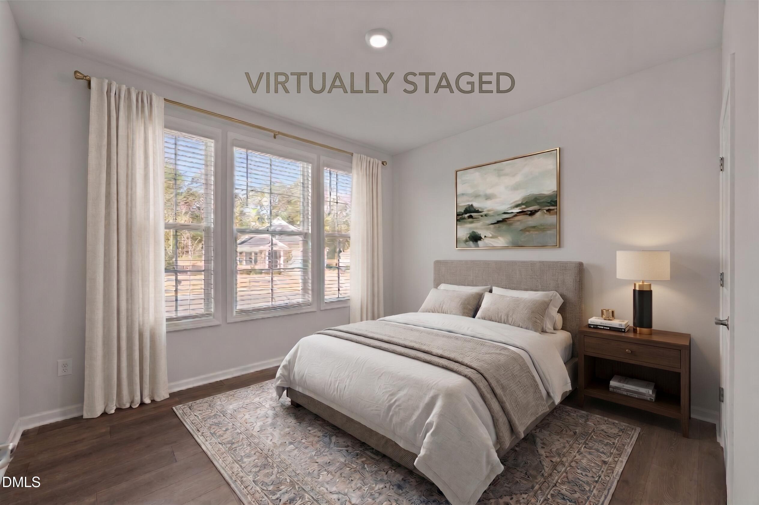 1639 Abberly Place Graham, NC 27253 - Photo 22 of 44 a bedroom with a bed and a window