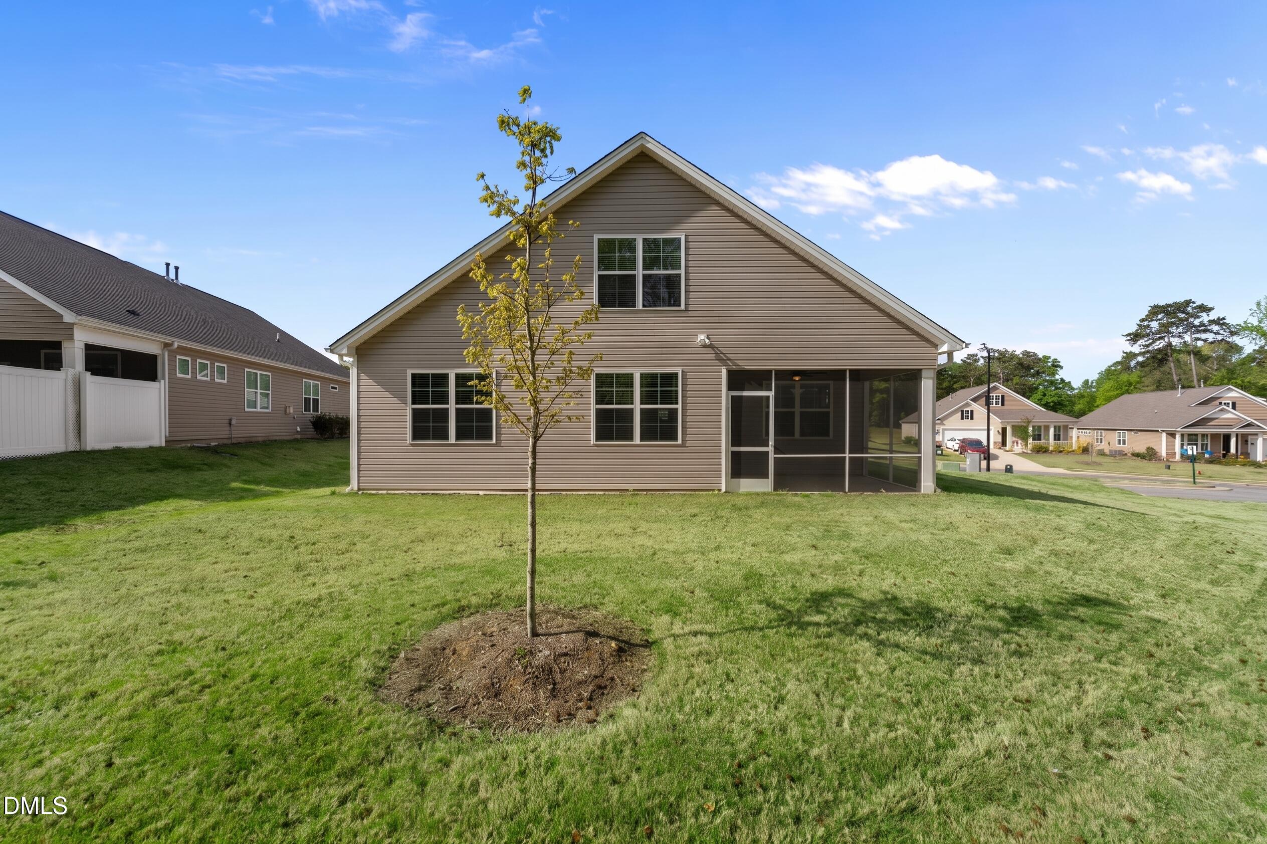 1639 Abberly Place Graham, NC 27253 - Photo 33 of 44 a view of a house with backyard