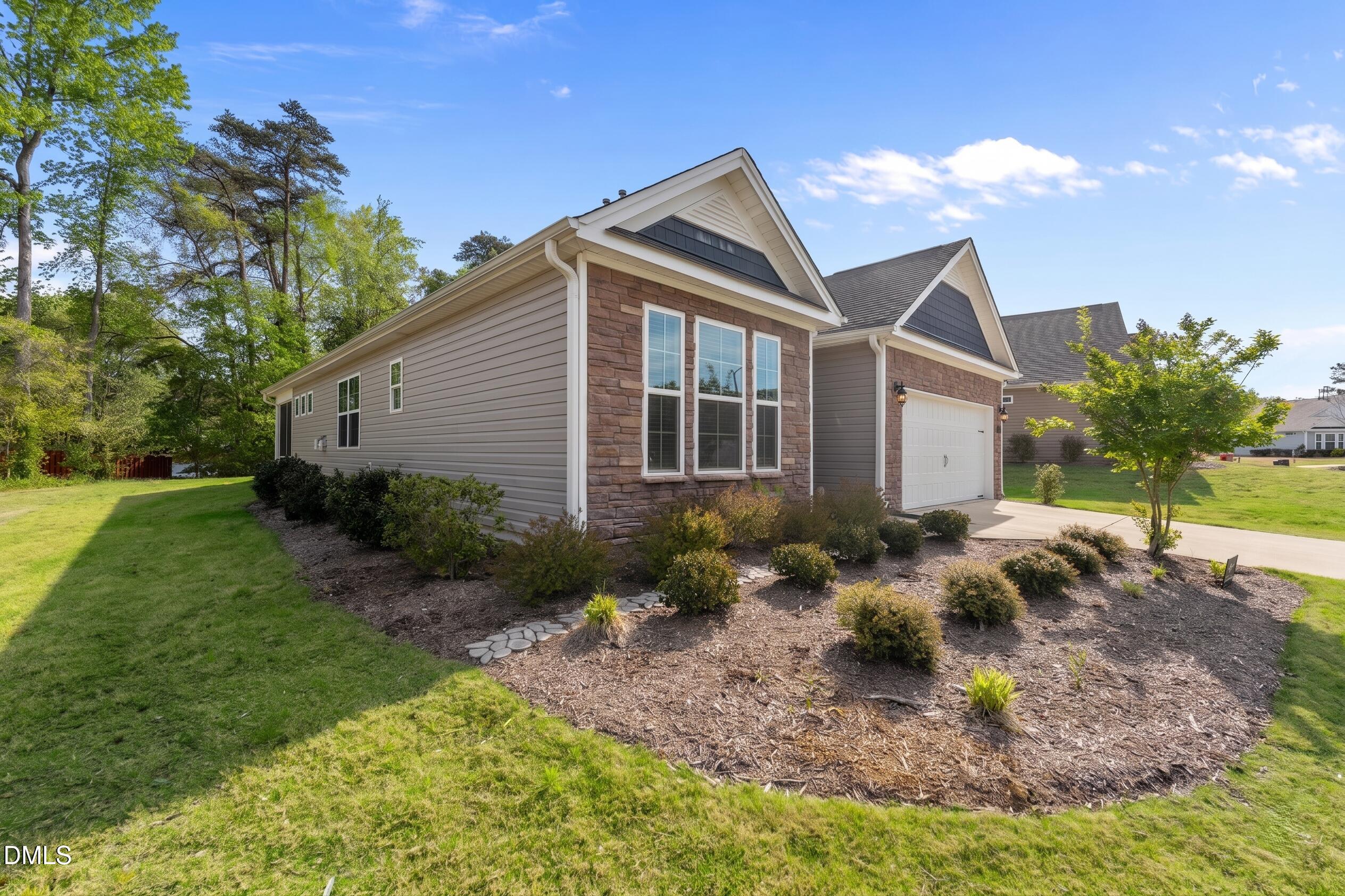 1639 Abberly Place Graham, NC 27253 - Photo 35 of 44 a view of a house with backyard and sitting area