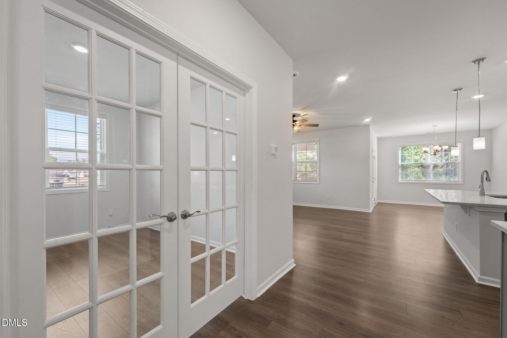 1639 Abberly Place Graham, NC 27253 - Photo 3 of 44 a view of an empty room with a window and wooden floor