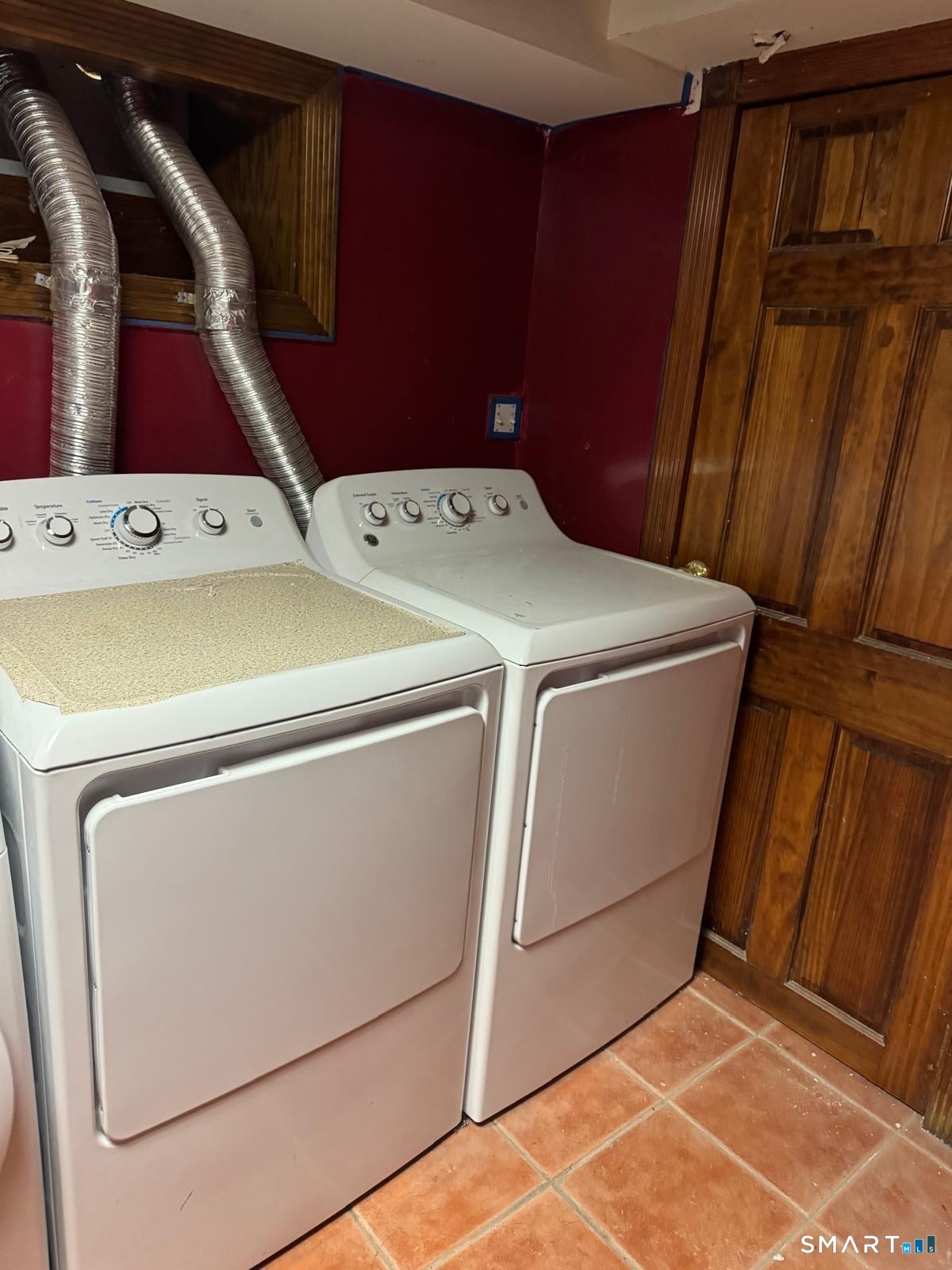 162 Fox Street, Unit 2 Bridgeport, CT 06605 - Photo 18 of 23 a utility room with dryer and washer