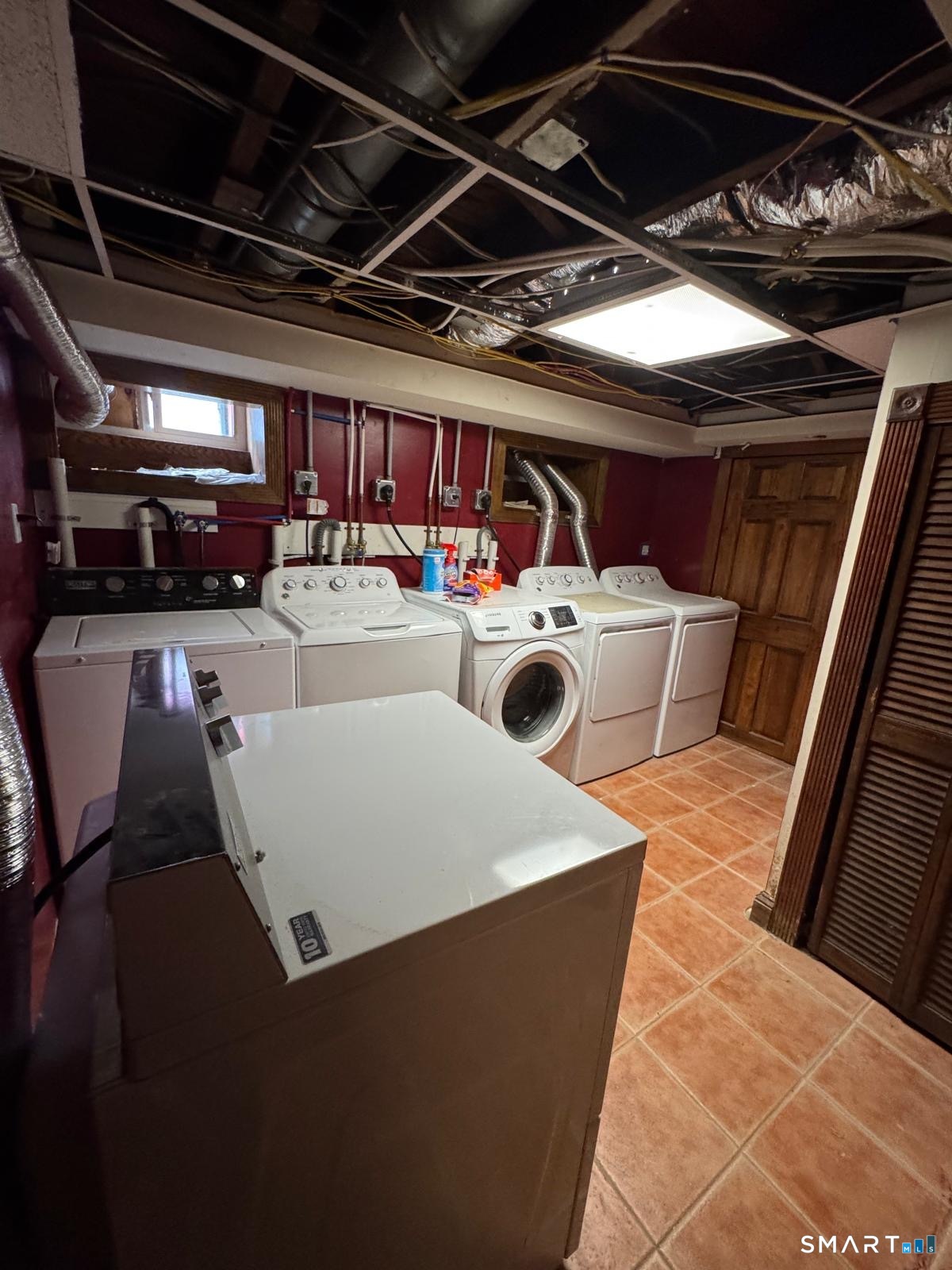 162 Fox Street, Unit 2 Bridgeport, CT 06605 - Photo 19 of 23 a view of a kitchen with storage and utility