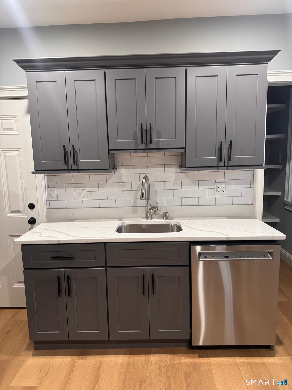162 Fox Street, Unit 2 Bridgeport, CT 06605 - Photo 4 of 23 a kitchen with a sink and cabinets