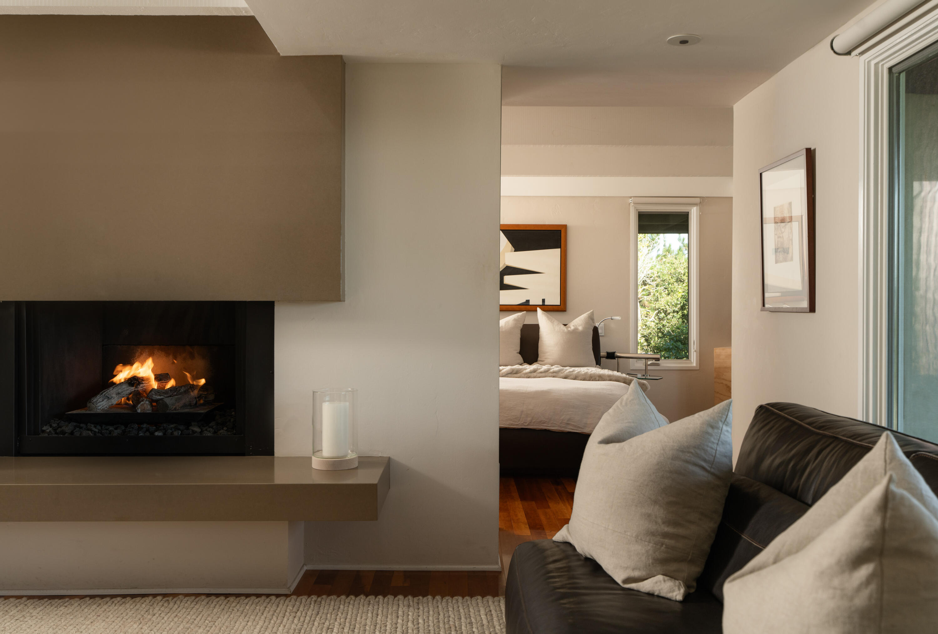 1315 Mission Ridge Road Santa Barbara, CA 93103 - Photo 17 of 34 a living room with furniture a flat screen tv and a fireplace