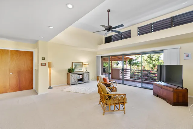 a kitchen with a refrigerator and a sink