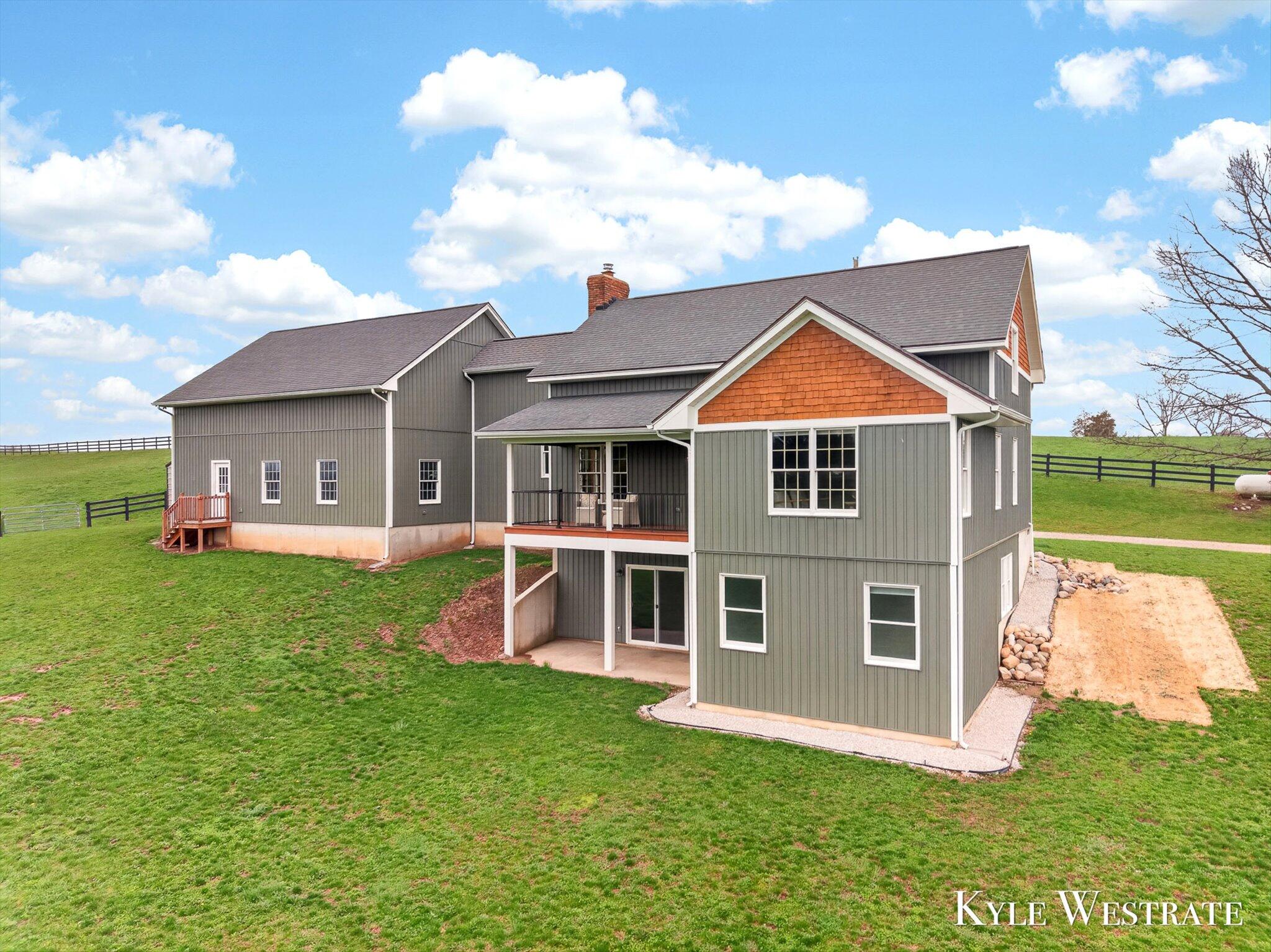 8977 2 Mile Road Northeast Ada, MI 49301 - Photo 2 of 51 08-DJI_20260415171935_0828_D_KYLE