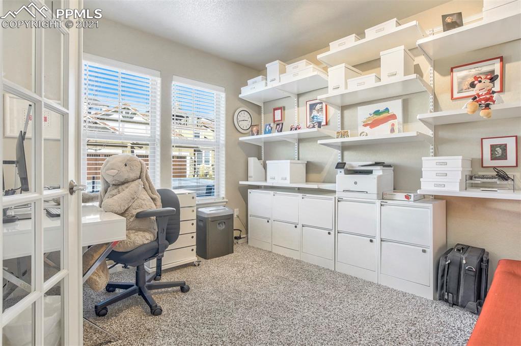 835 Citrine View Colorado Springs, CO 80921 - Photo 19 of 50 a room with a workspace