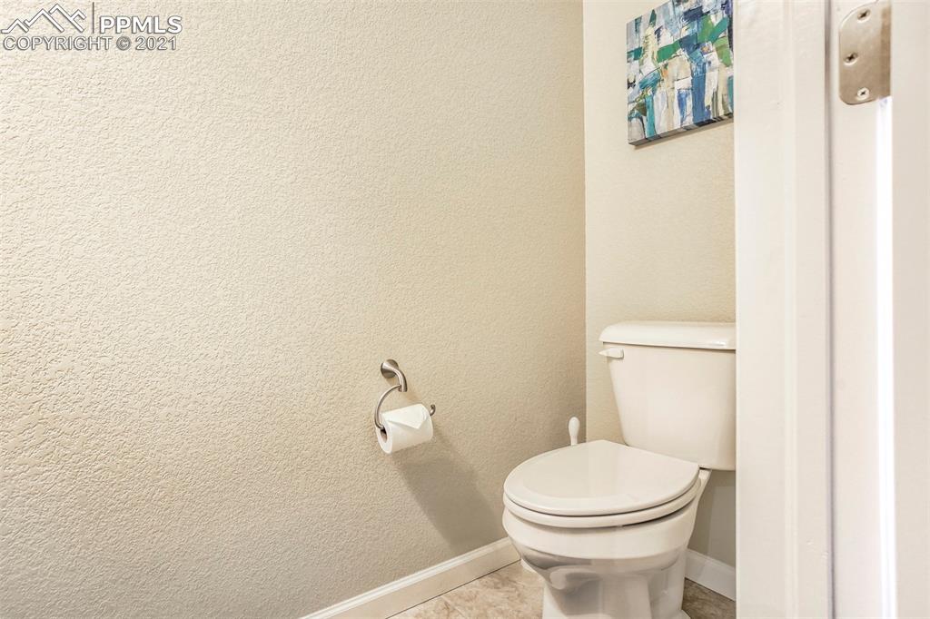 835 Citrine View Colorado Springs, CO 80921 - Photo 22 of 50 a white toilet sitting next to a white wall