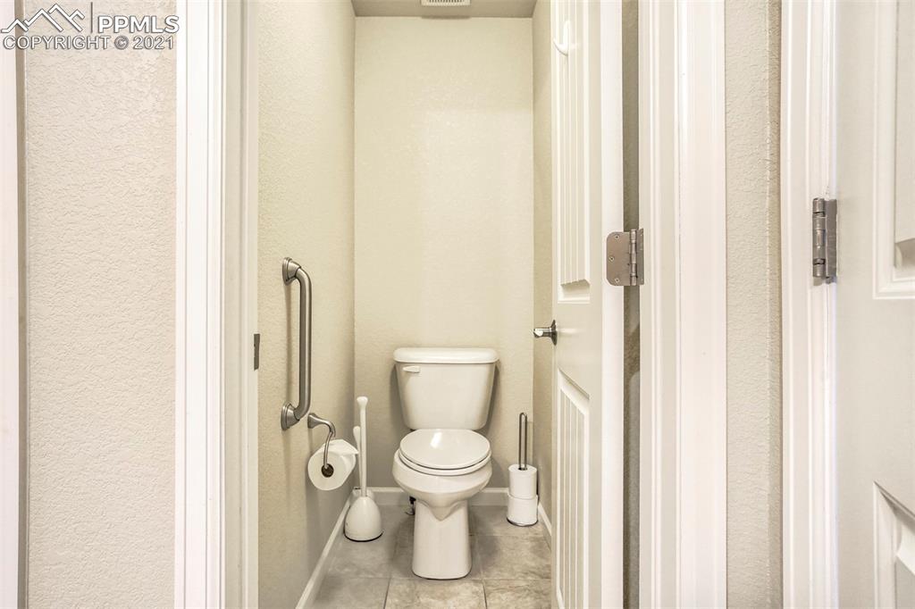 835 Citrine View Colorado Springs, CO 80921 - Photo 25 of 50 a bathroom with a toilet and a shower