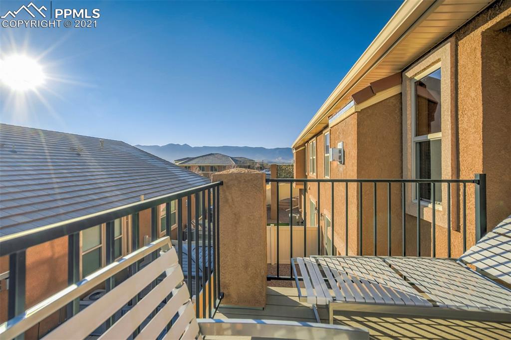 835 Citrine View Colorado Springs, CO 80921 - Photo 43 of 50 a view of balcony with wooden floor