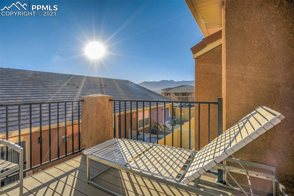 835 Citrine View Colorado Springs, CO 80921 - Photo 45 of 50 a view of balcony with wooden floor