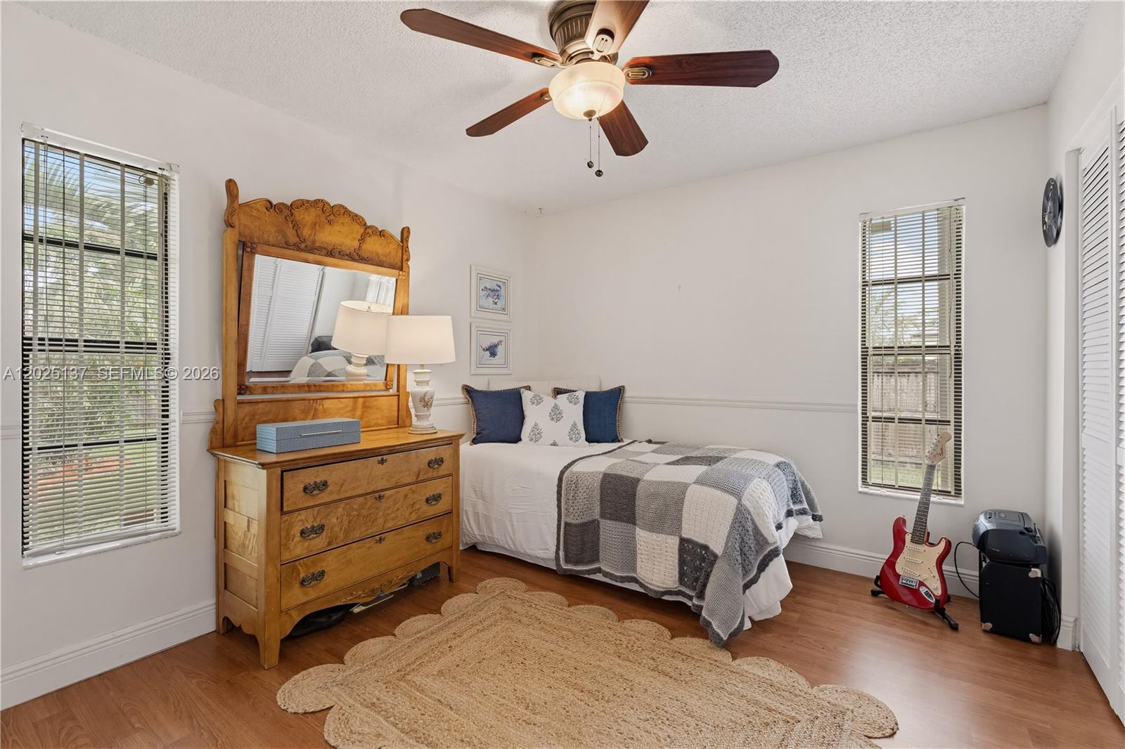 11480 Southwest 96th Terrace Miami, FL 33176 - Photo 18 of 54 a bed room with a bed and a window