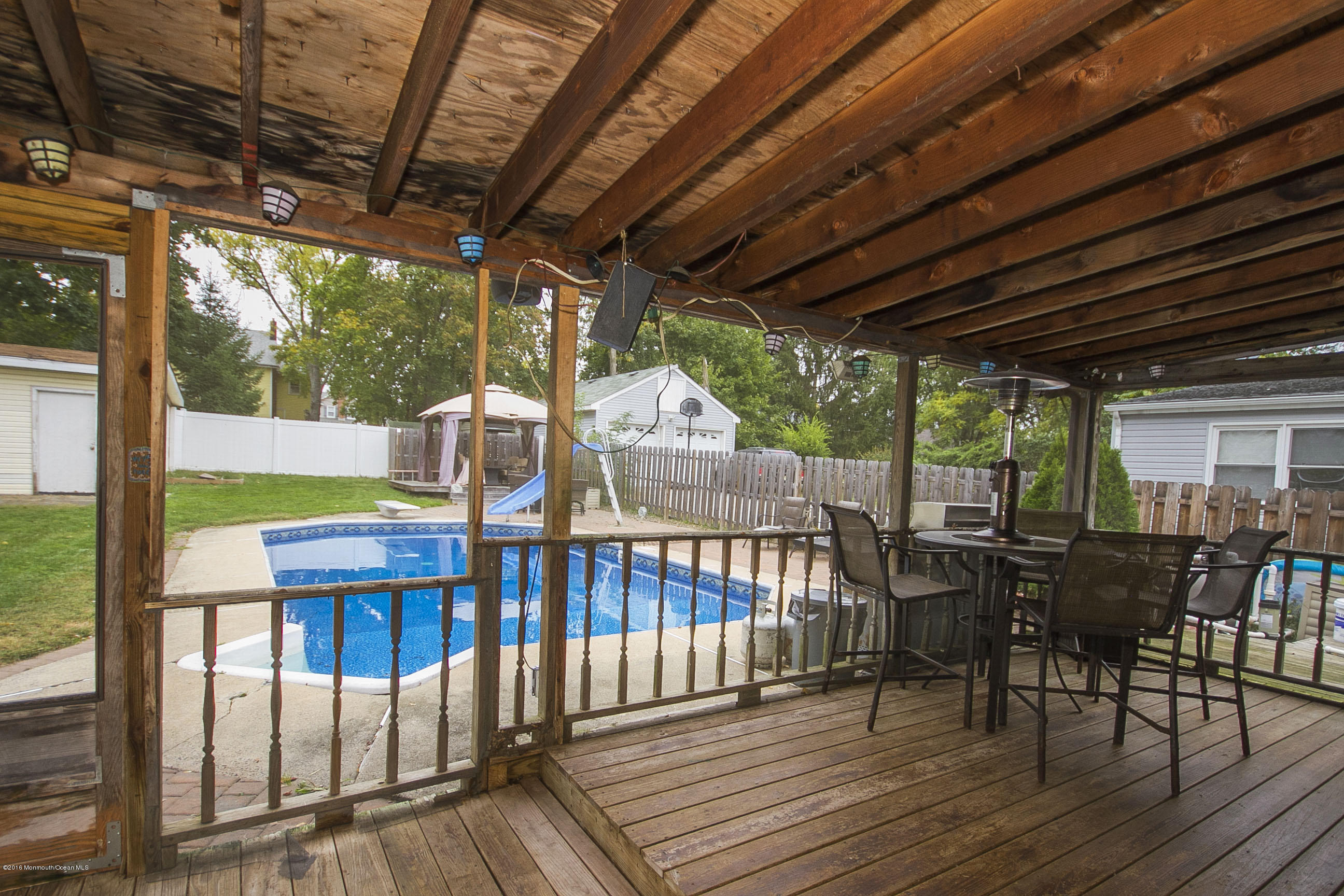 272 Main Street Matawan, NJ 07747 - Photo 11 of 36 a view of a chairs and table in the patio