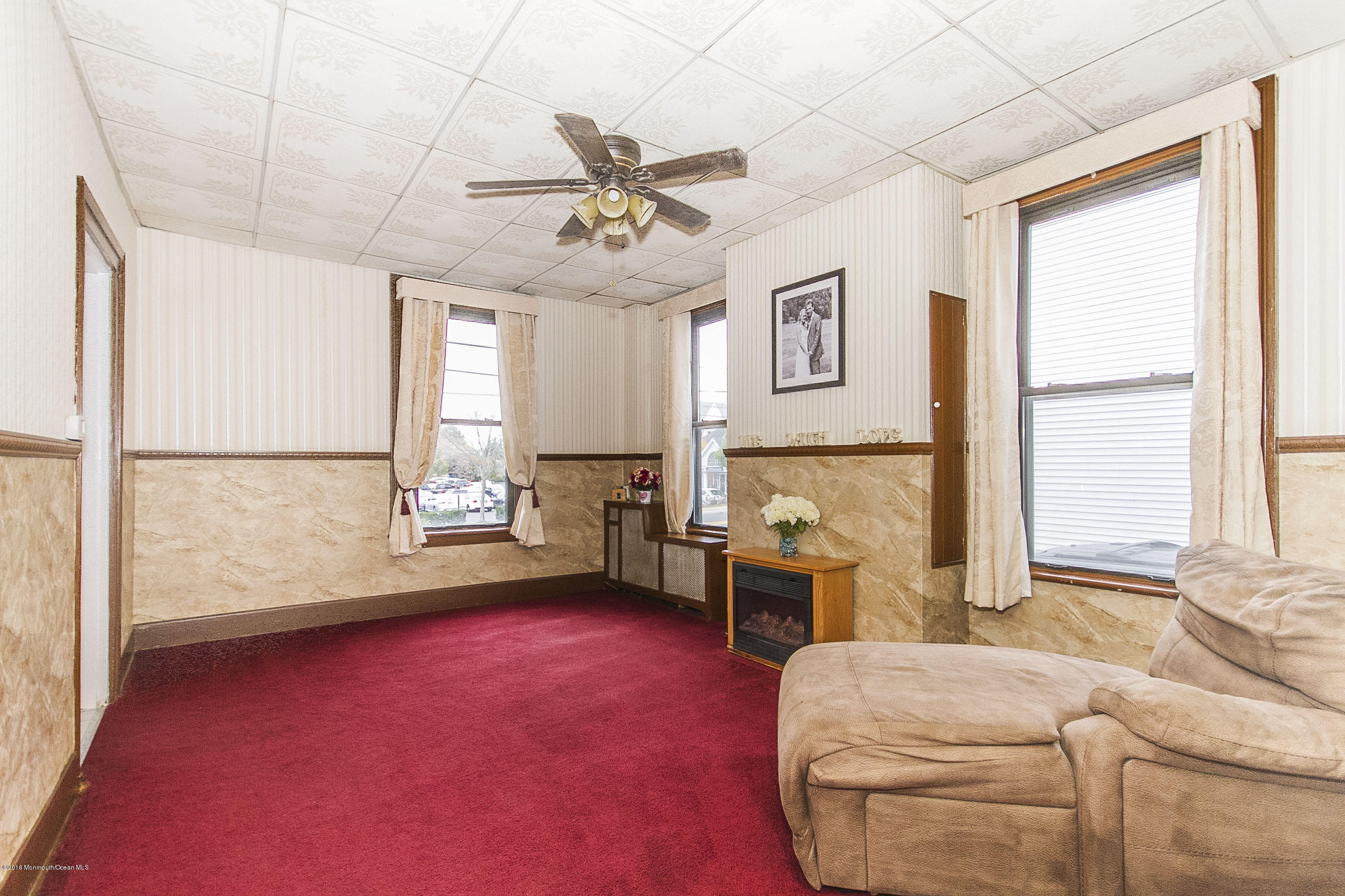 272 Main Street Matawan, NJ 07747 - Photo 17 of 36 a bedroom with furniture and a window