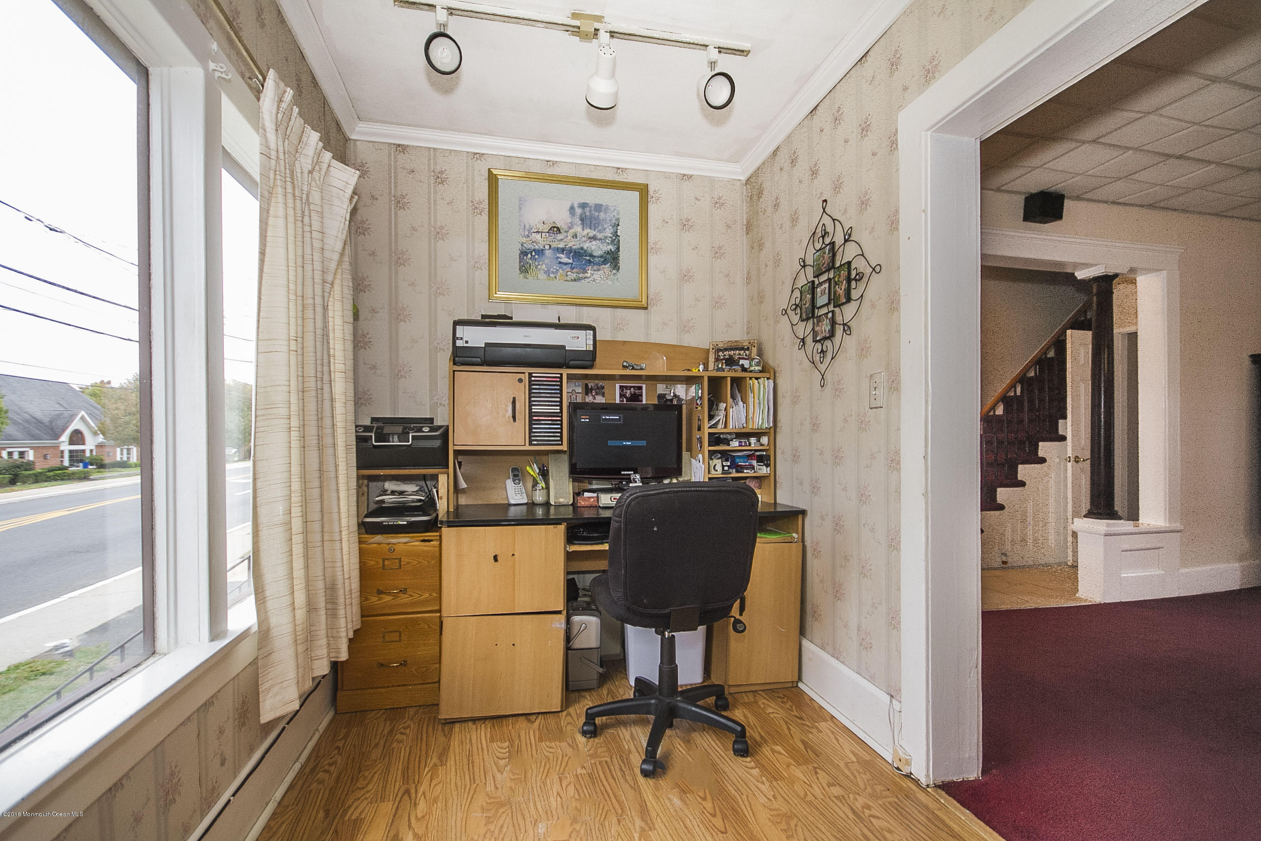 272 Main Street Matawan, NJ 07747 - Photo 21 of 36 a view of a workspace with furniture and a window