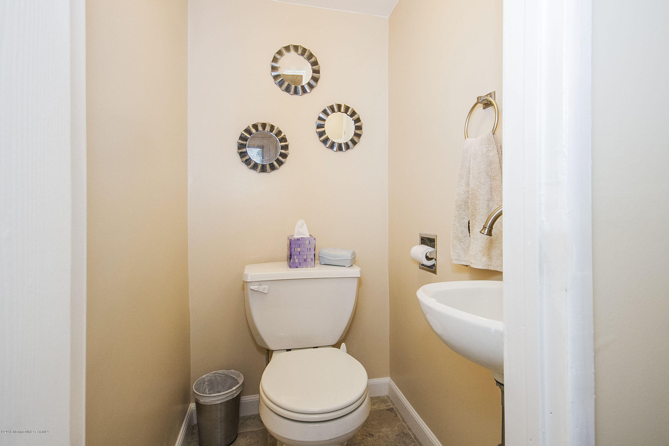 272 Main Street Matawan, NJ 07747 - Photo 23 of 36 a white toilet sitting next to a bathroom sink
