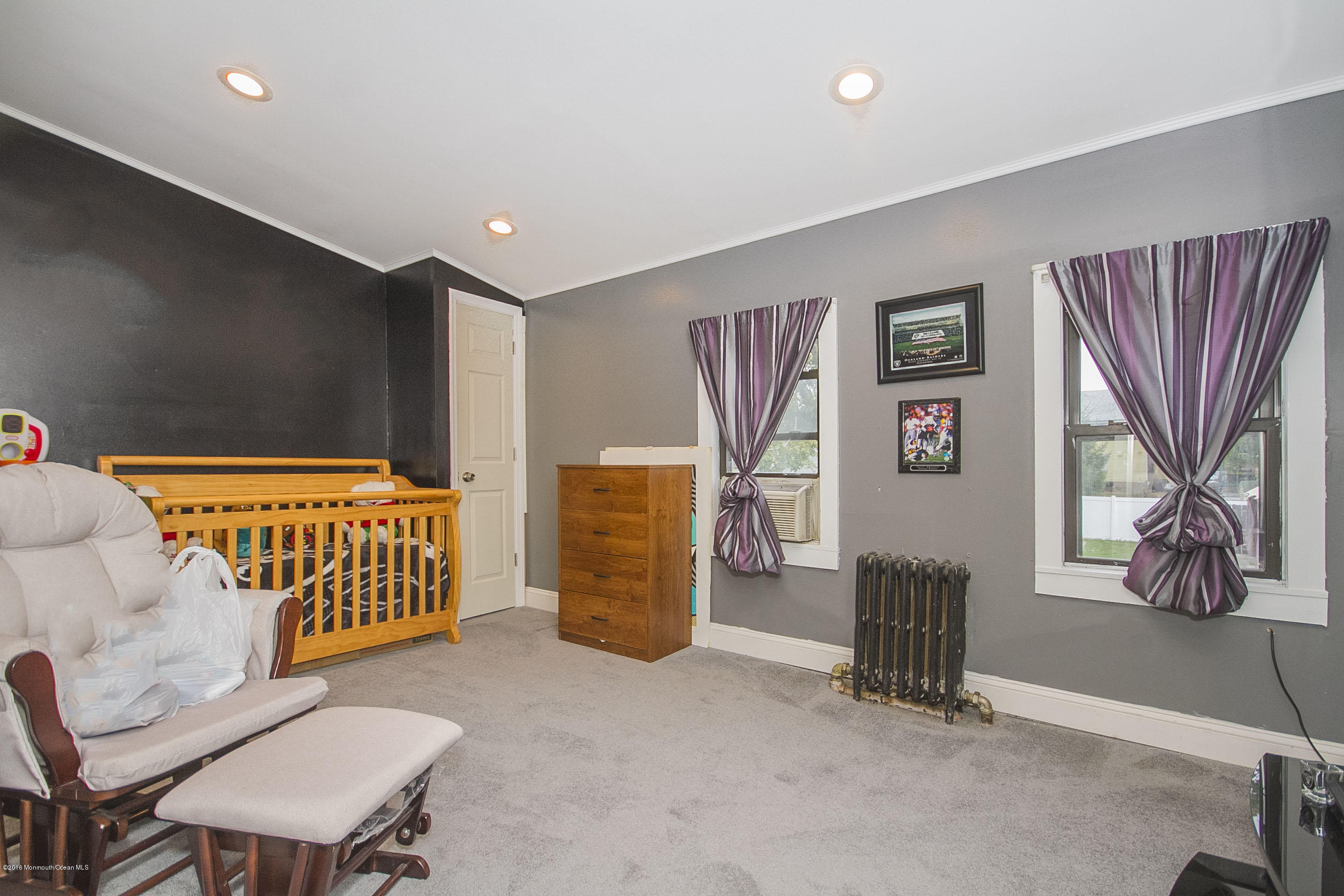 272 Main Street Matawan, NJ 07747 - Photo 25 of 36 a bedroom with furniture and a window