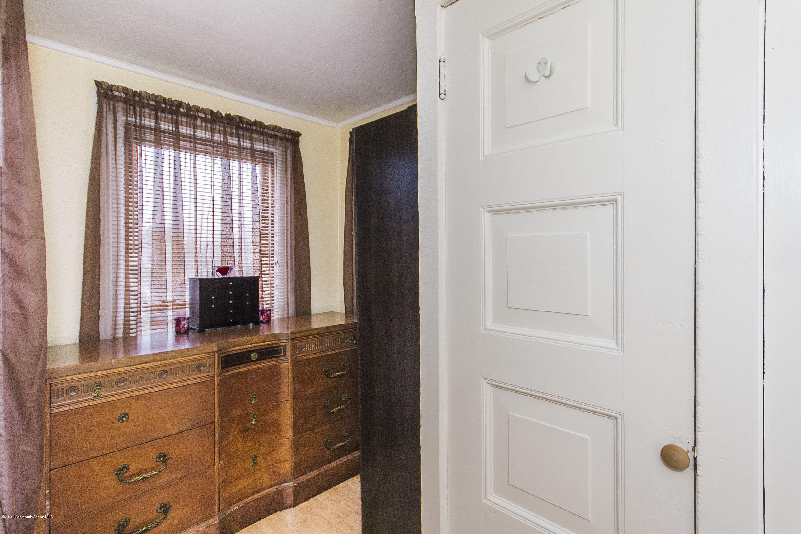 272 Main Street Matawan, NJ 07747 - Photo 34 of 36 a view of a dresser and mirror