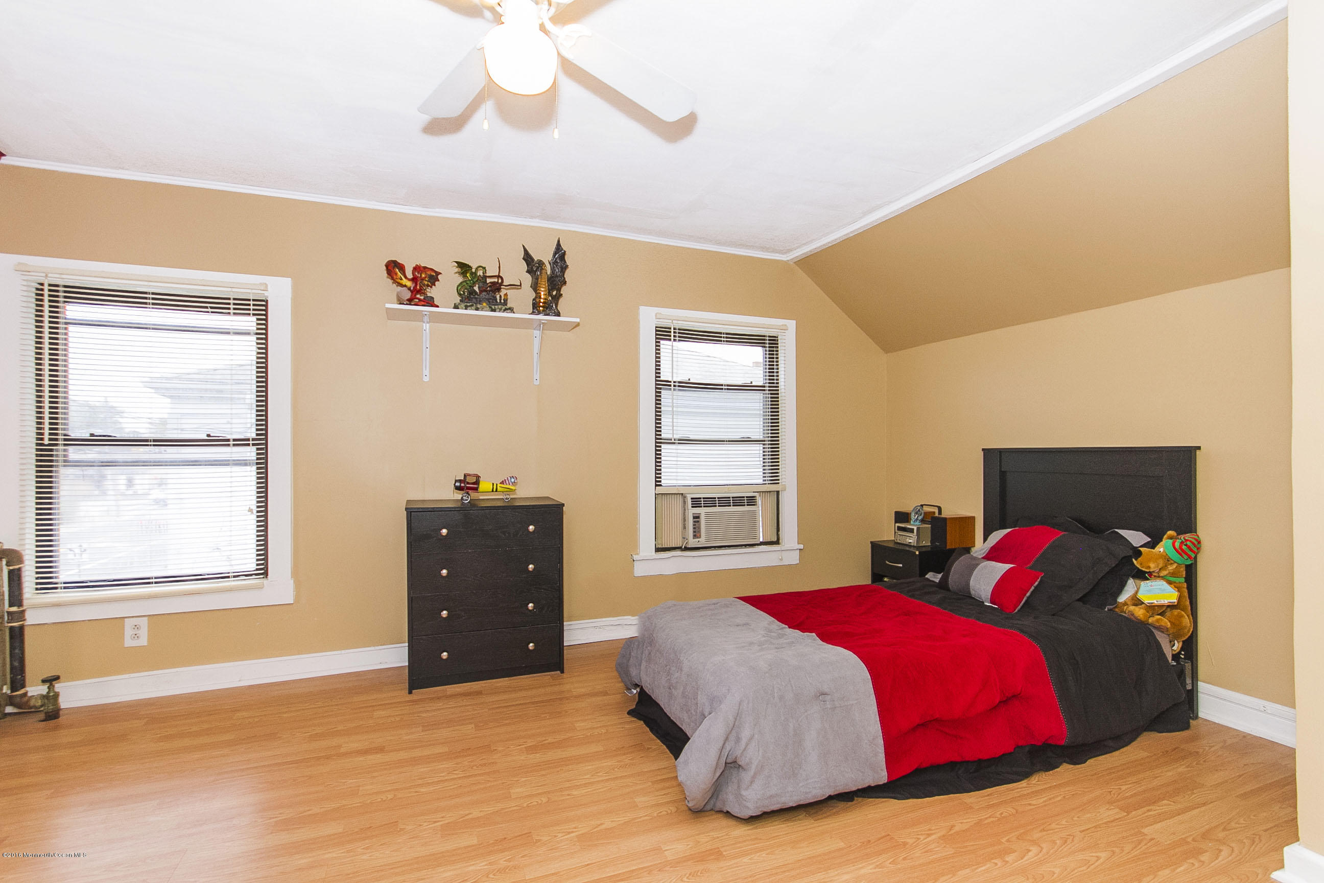 272 Main Street Matawan, NJ 07747 - Photo 35 of 36 a bedroom with a bed and a window