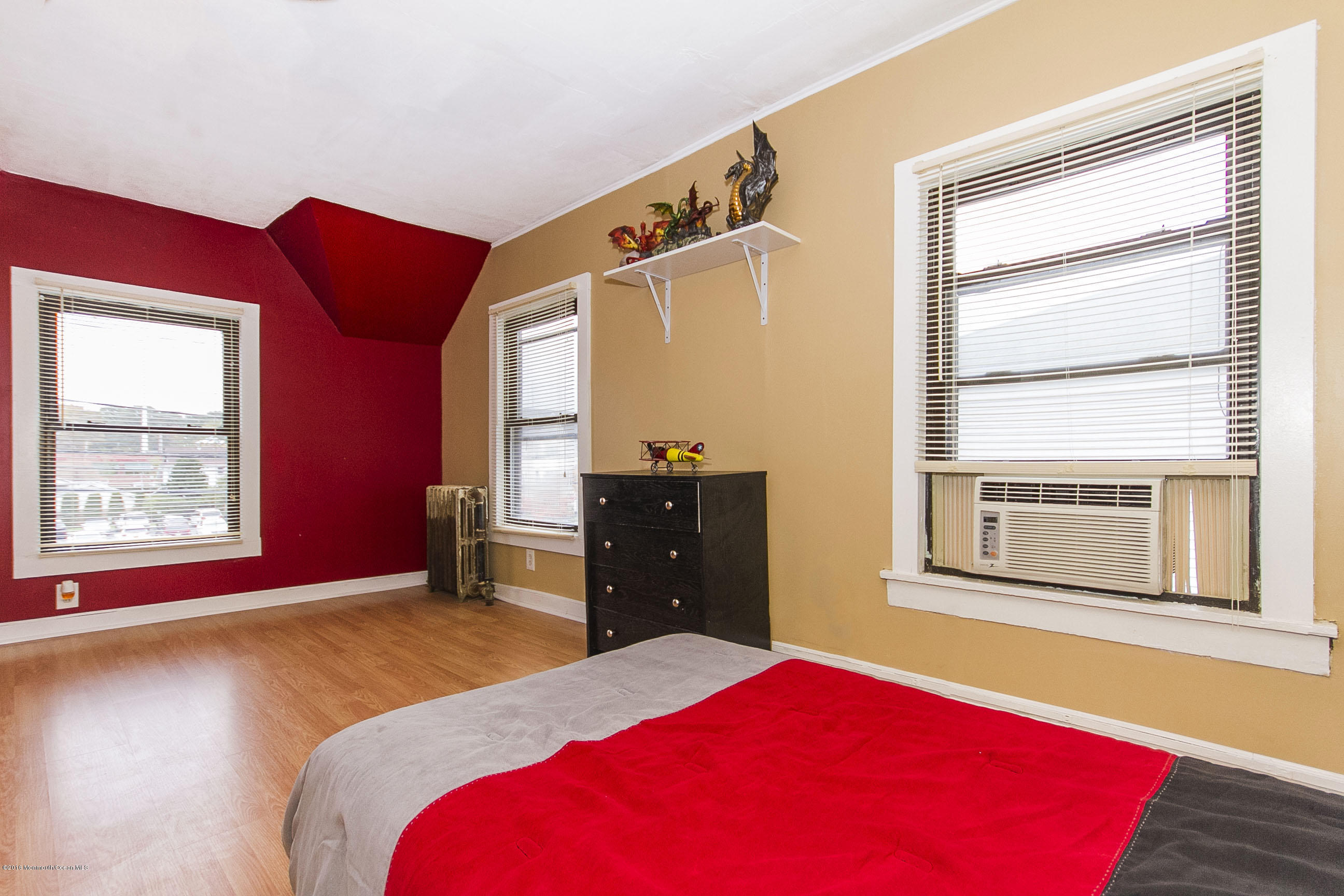 272 Main Street Matawan, NJ 07747 - Photo 36 of 36 a bedroom with a bed and a window