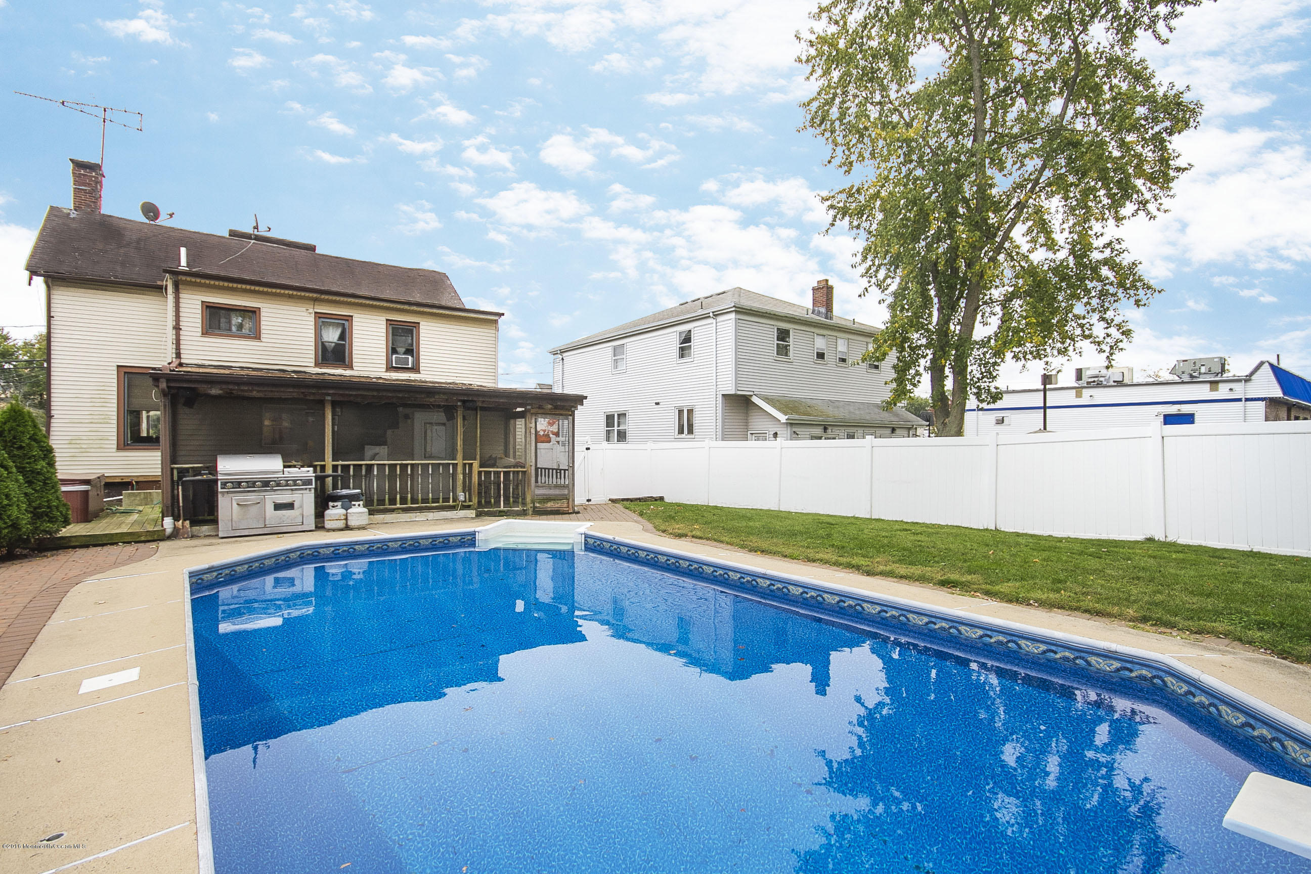 272 Main Street Matawan, NJ 07747 - Photo 6 of 36 a front view of a house with swimming pool