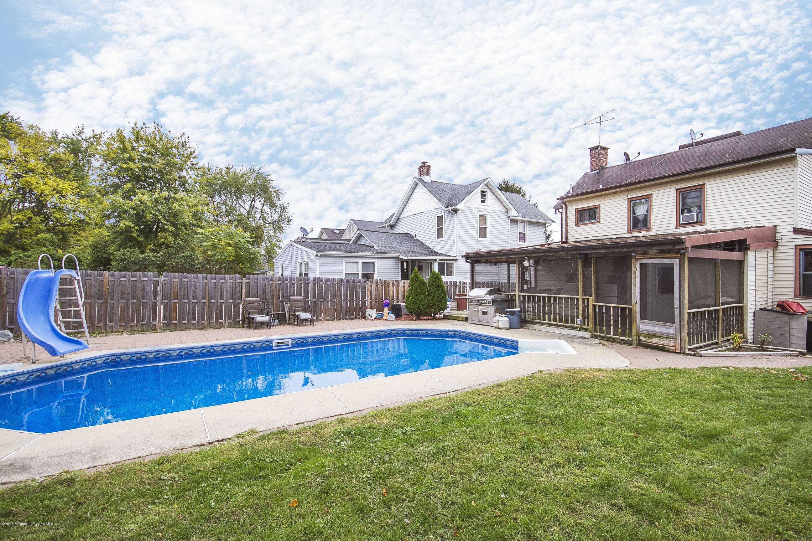 272 Main Street Matawan, NJ 07747 - Photo 7 of 36 a view of a house with swimming pool and sitting area