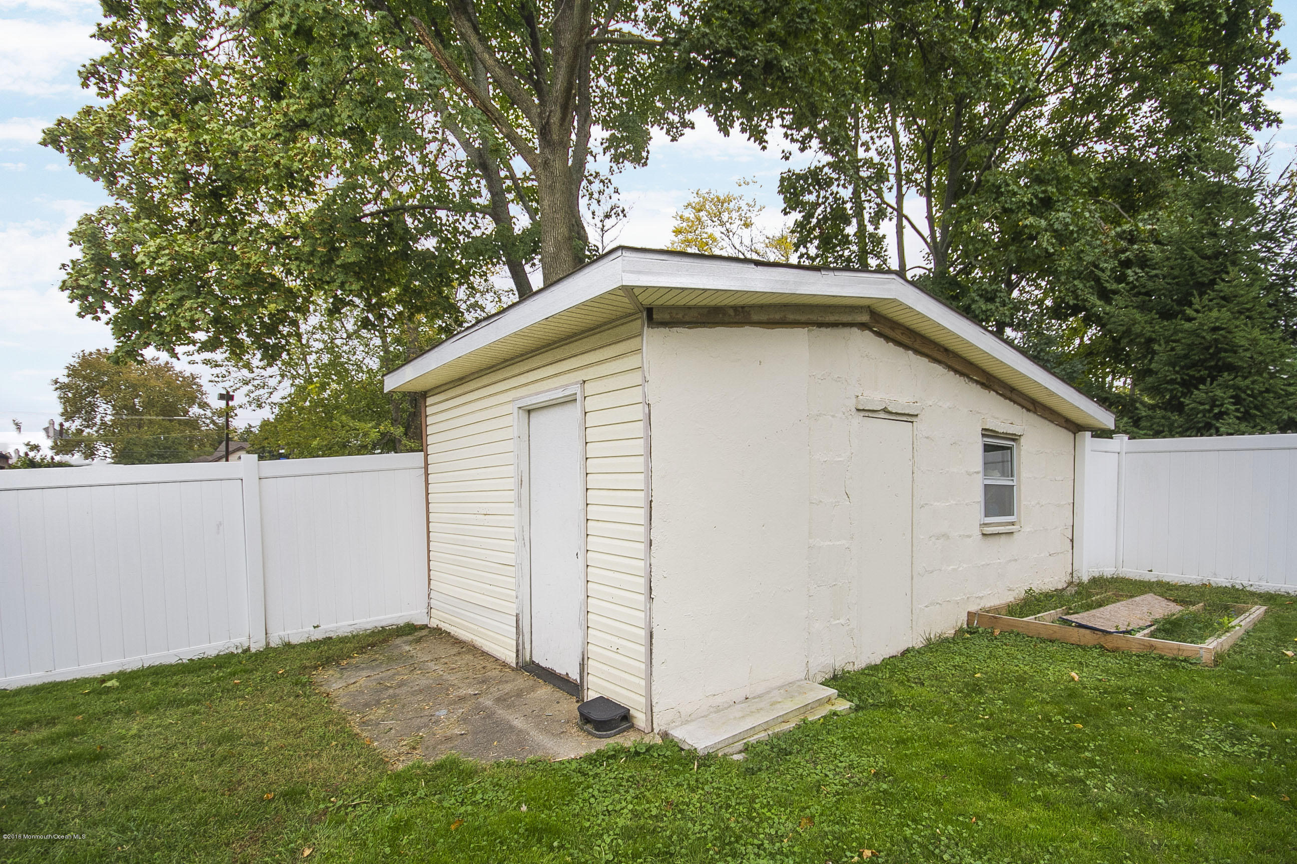 272 Main Street Matawan, NJ 07747 - Photo 10 of 36 a backyard of a house with lots of green space