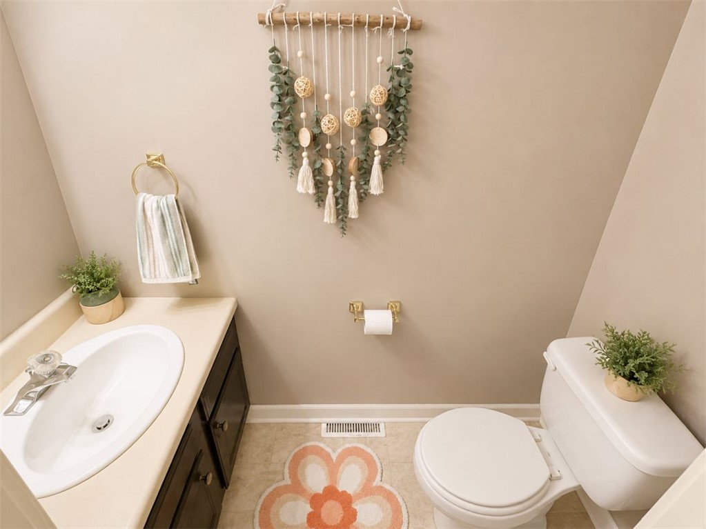 2018 Cardinal Park Drive Anderson, SC 29621 - Photo 5 of 11 Functional full bathroom featuring a convenient vanity with integrated sink and easy-care flooring.