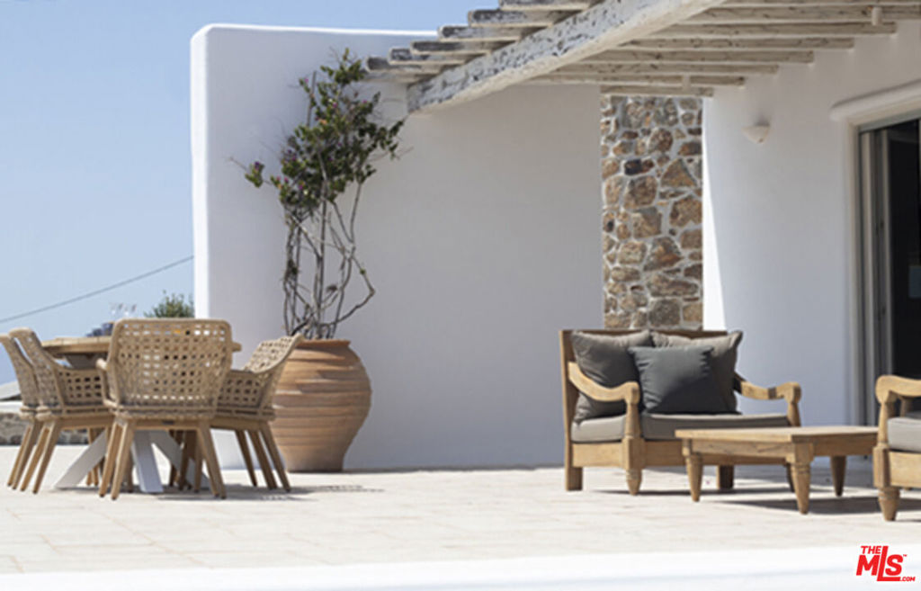 0 East Mykonos Greece undefined, undefined 0 - Photo 12 of 48 a view of a dining room with furniture and wooden floor