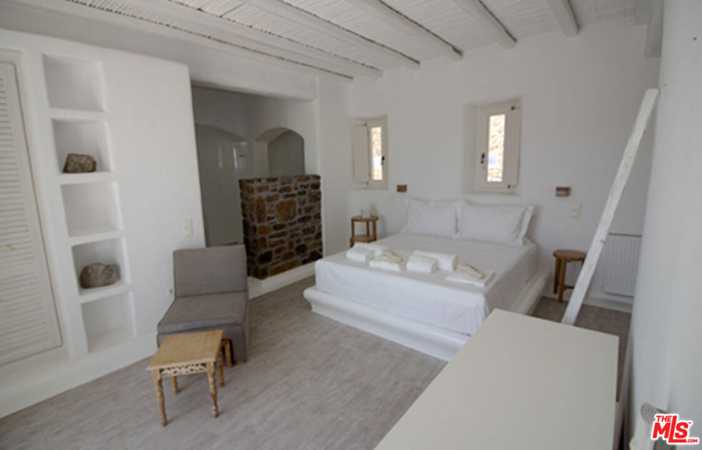 0 East Mykonos Greece undefined, undefined 0 - Photo 16 of 48 a living room with furniture and a rug