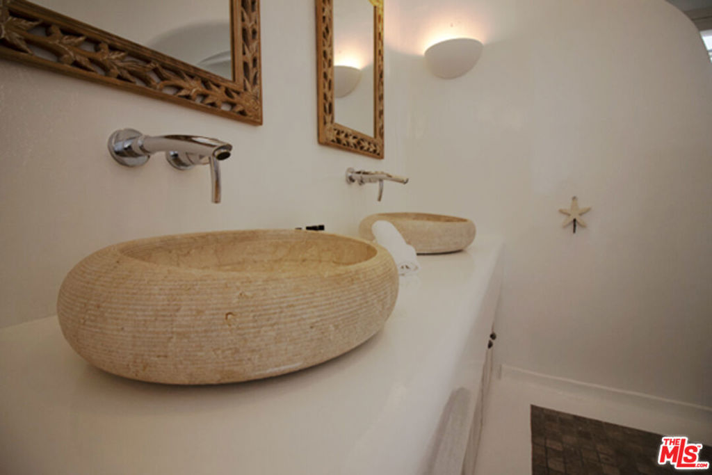 0 East Mykonos Greece undefined, undefined 0 - Photo 20 of 48 a bathroom with a sink and mirror