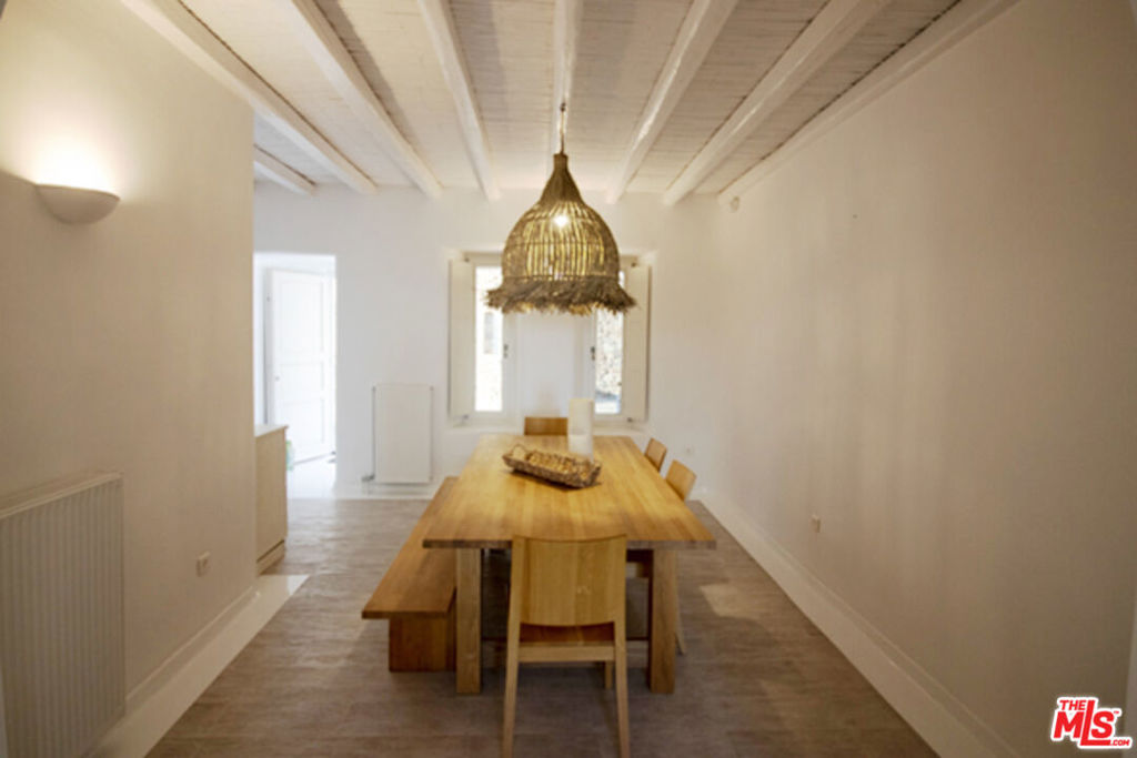 0 East Mykonos Greece undefined, undefined 0 - Photo 32 of 48 a view of a dining room with furniture window and wooden floor