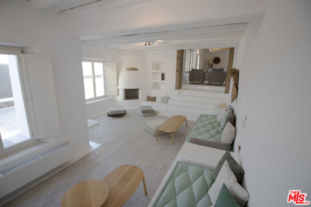 0 East Mykonos Greece undefined, undefined 0 - Photo 33 of 48 a living room with furniture and a large window