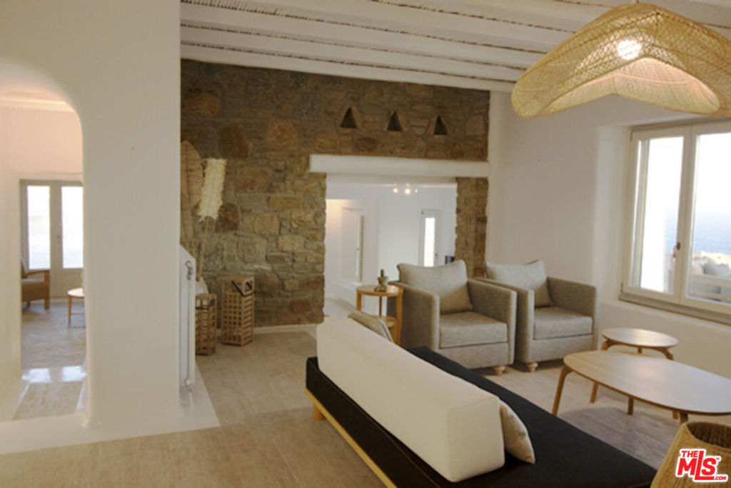 0 East Mykonos Greece undefined, undefined 0 - Photo 40 of 48 a living room with furniture and a fireplace