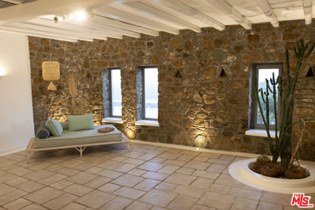 0 East Mykonos Greece undefined, undefined 0 - Photo 43 of 48 a living room with furniture and a fireplace