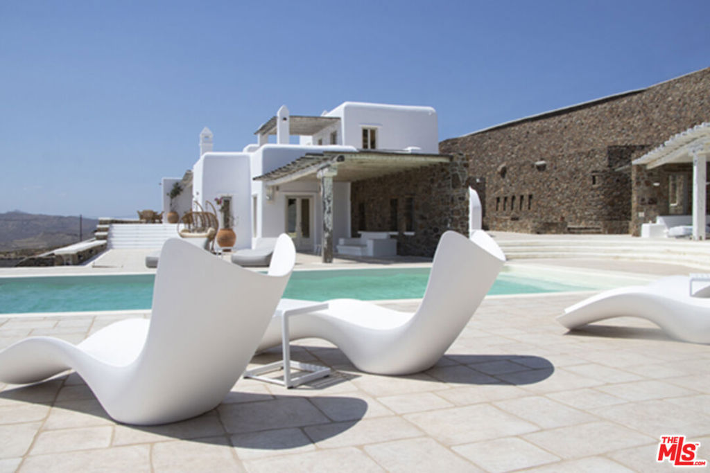 0 East Mykonos Greece undefined, undefined 0 - Photo 7 of 48 a living room with furniture and a fireplace