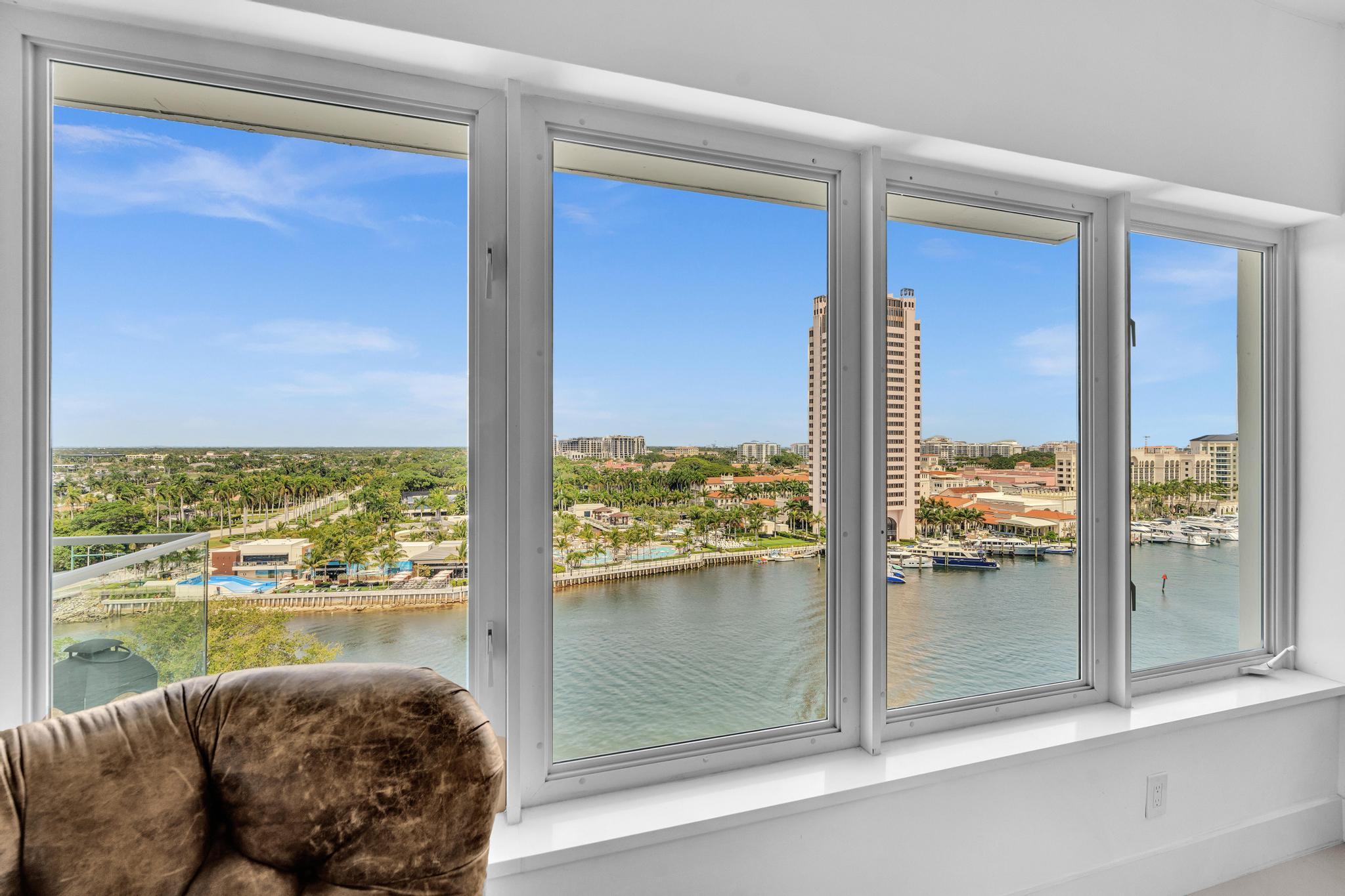 701 East Camino Real, Unit 12G Boca Raton, FL 33432 - Photo 5 of 82 a view of a living room and floor to ceiling window