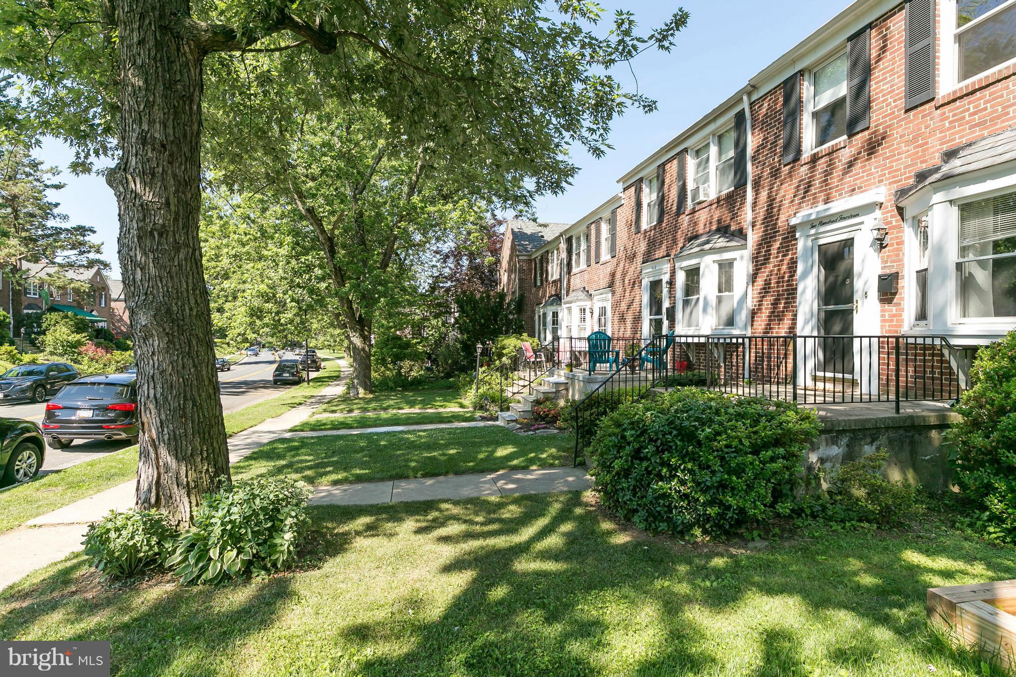 214 Stanmore Road Baltimore, MD 21212 - Photo 2 of 21 a view of a big yard with plants and large trees