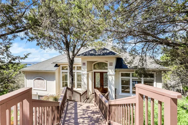 a front view of a house with a porch