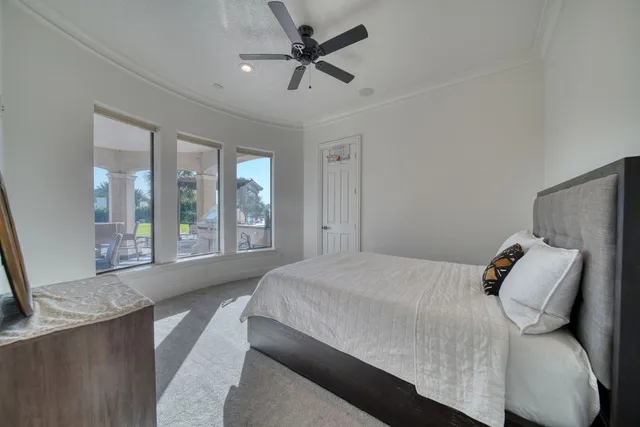 a room with furniture and a flat screen tv