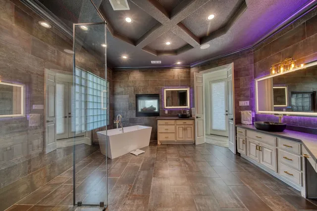 a room that has a table and a chandelier