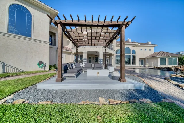 a bathroom with a shower sink and mirror
